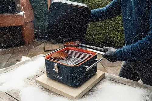 Everdure CUBE Portable Charcoal Grill, Tabletop BBQ, Perfect Tailgate, Beach, Patio, or Camping Grill, Lightweight & Compact Small Grill with Preparation Board & Food Storage Tray, Matte Black