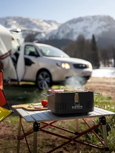 Everdure CUBE Portable Charcoal Grill, Tabletop BBQ, Perfect Tailgate, Beach, Patio, or Camping Grill, Lightweight & Compact Small Grill with Preparation Board & Food Storage Tray, Matte Black