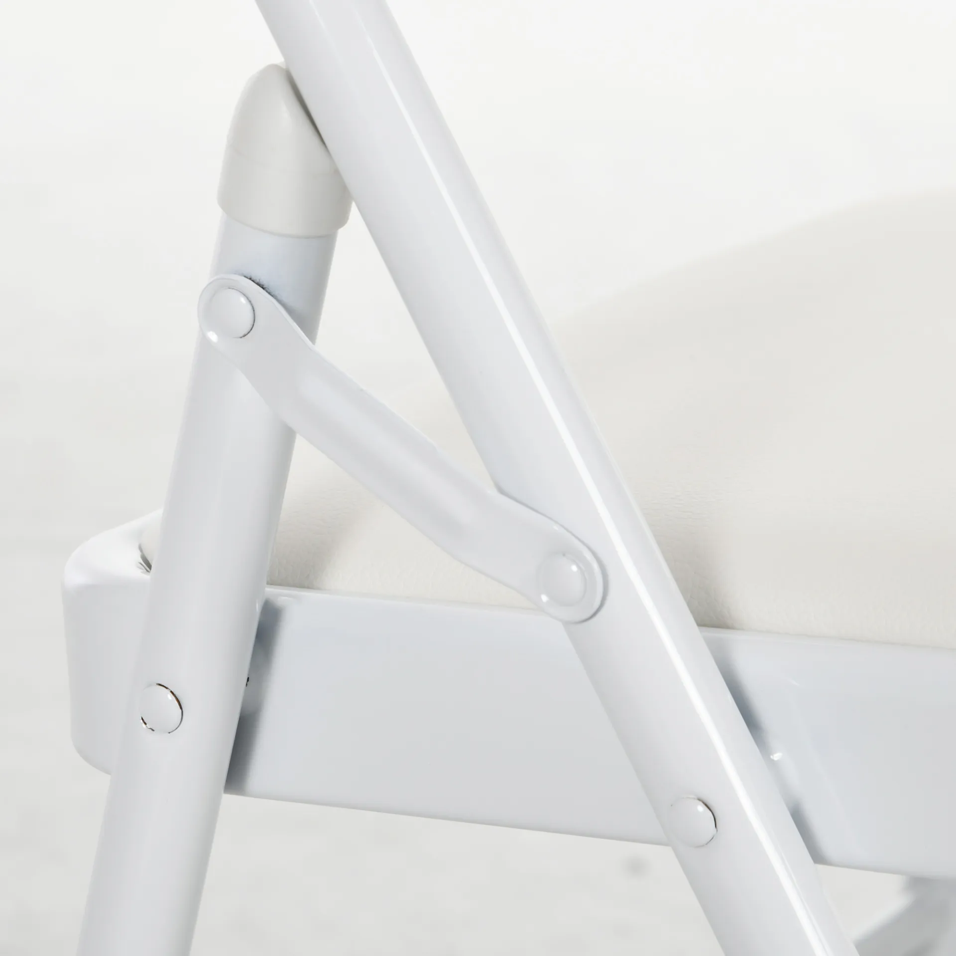 Set of 2 Padded Folding Chairs PU Leather with Cushioned Seat and Metal Frame in White | HOMCOM